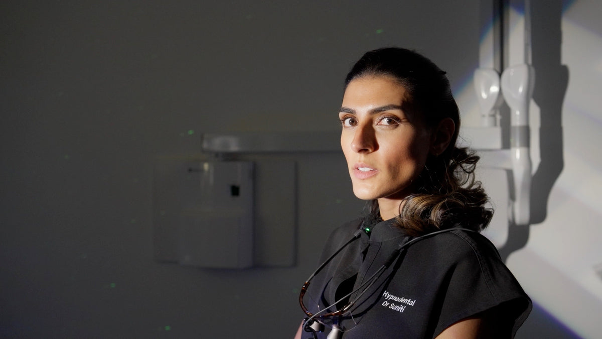 Dr Suniti in relaxed lighting pre hypnotherapy.